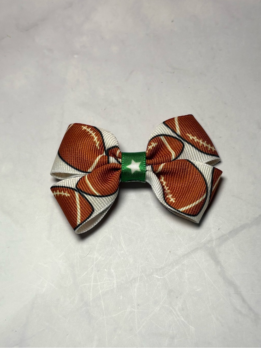 🏈 Football Print Hair Bow with Green Star/Football Center